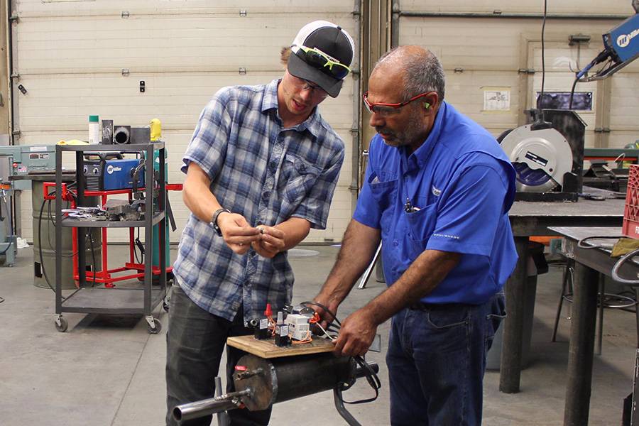 Students prepare for Twisted Metal Mayhem. 