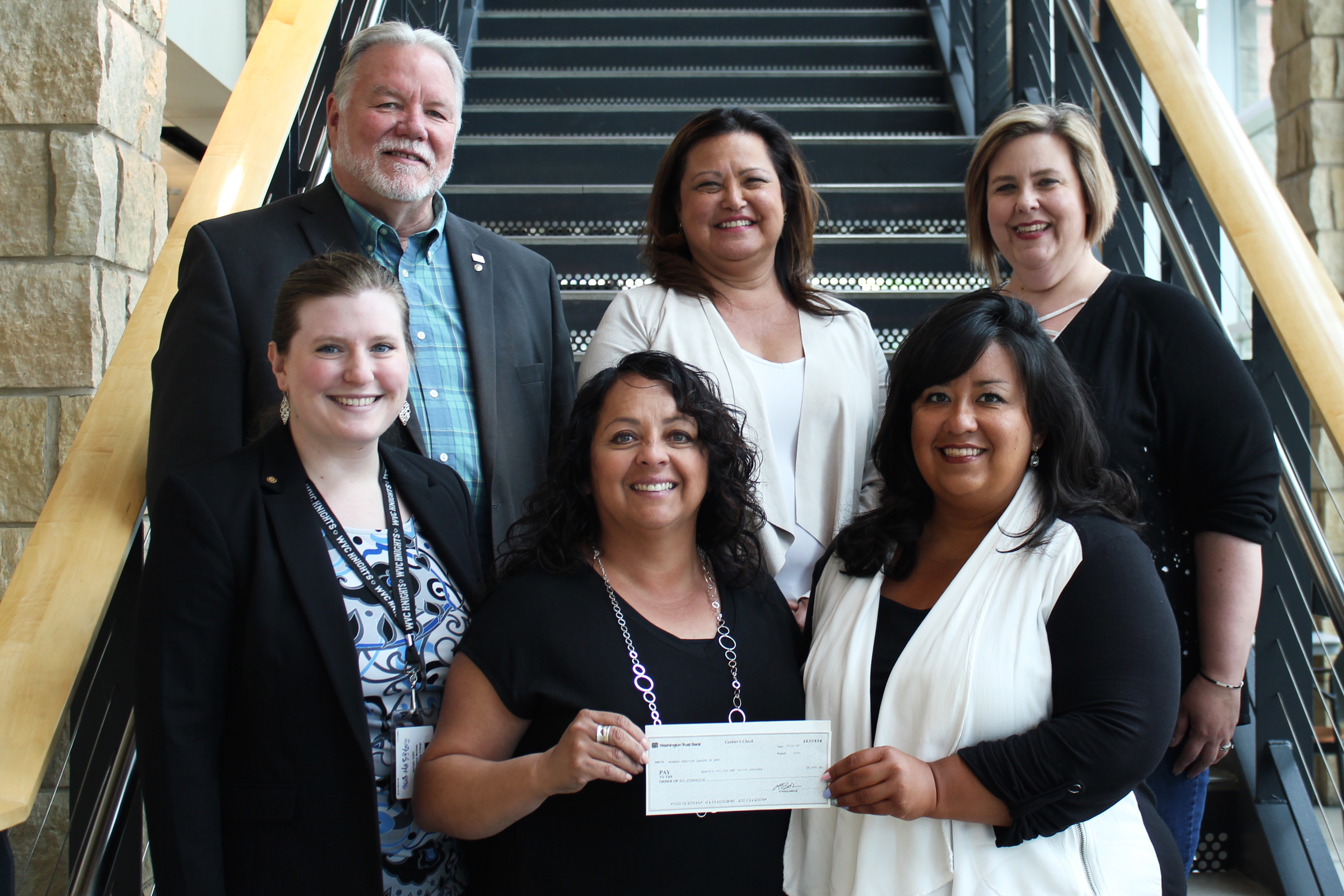 Gorup photo of Women's Service League of North Central Washington and Weantchee Valley College employees.