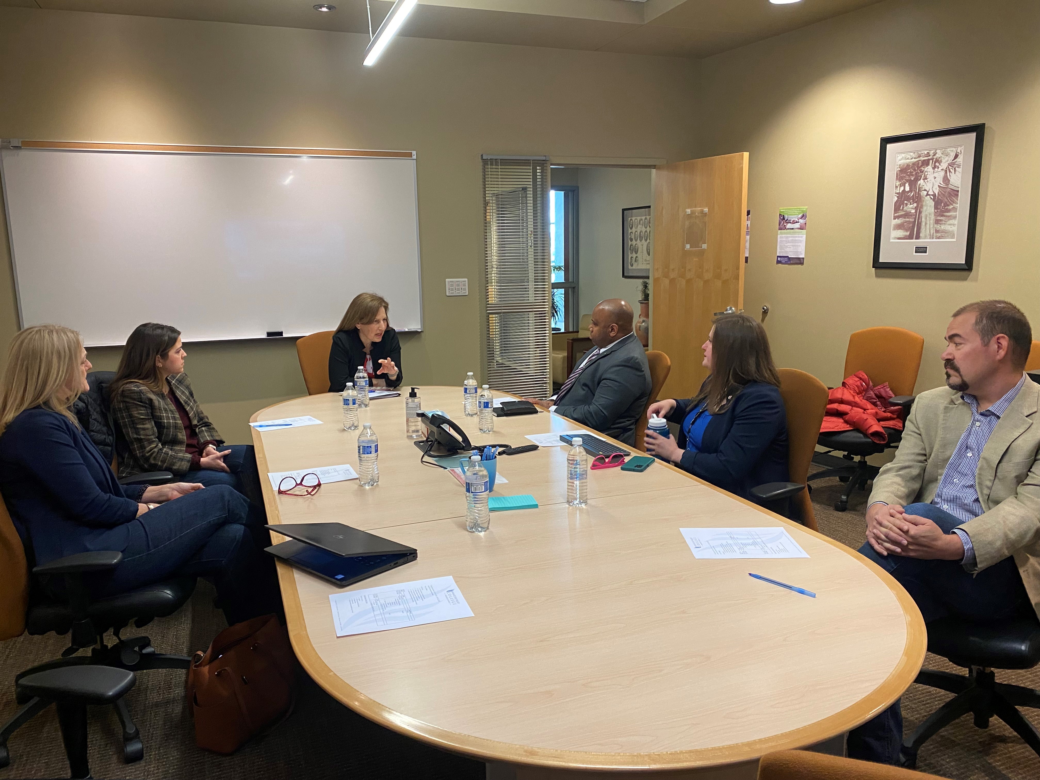 President Faimous Harrison meets with representative Kim Schrier