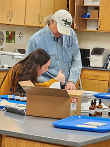 Dr. Jeff Bullock works with a WVC student