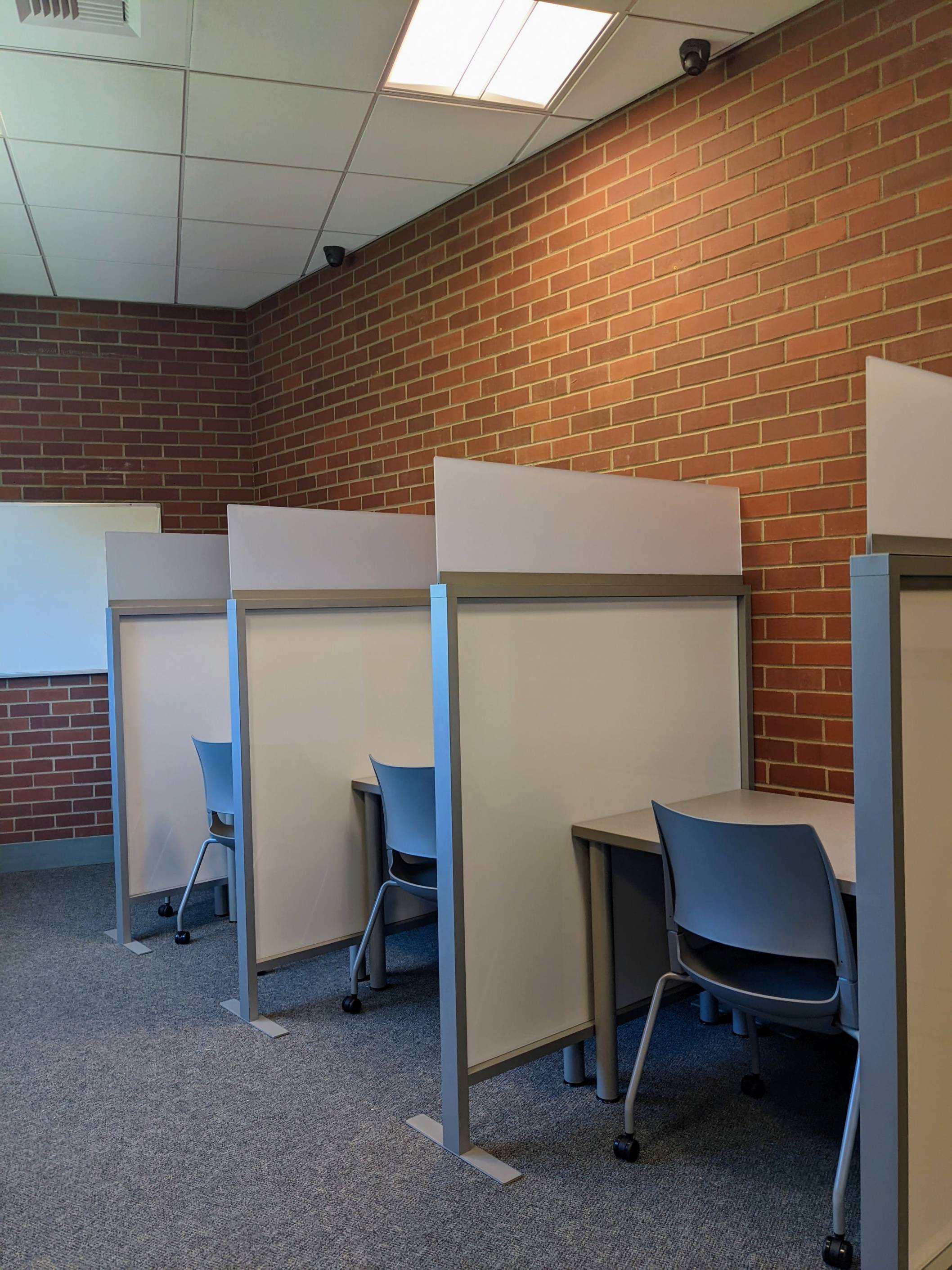 Distraction reduced testing space - 3 cubicles with chairs